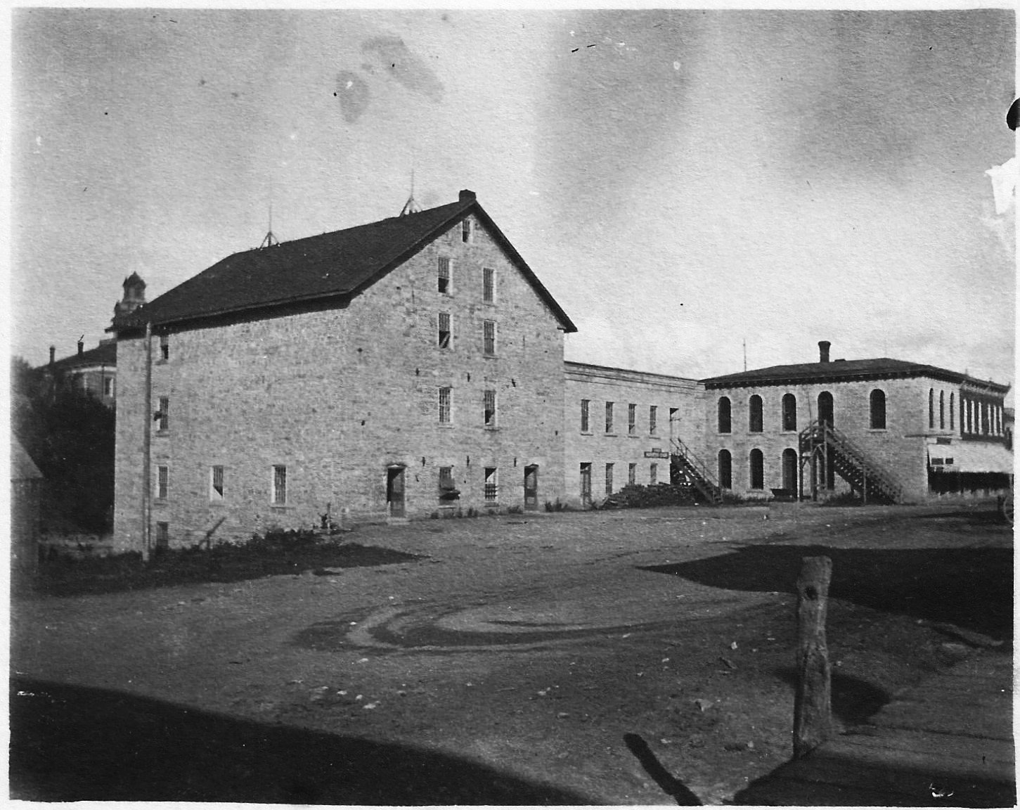 The mill, its storeroom and the cooperage on Main Street, 1899