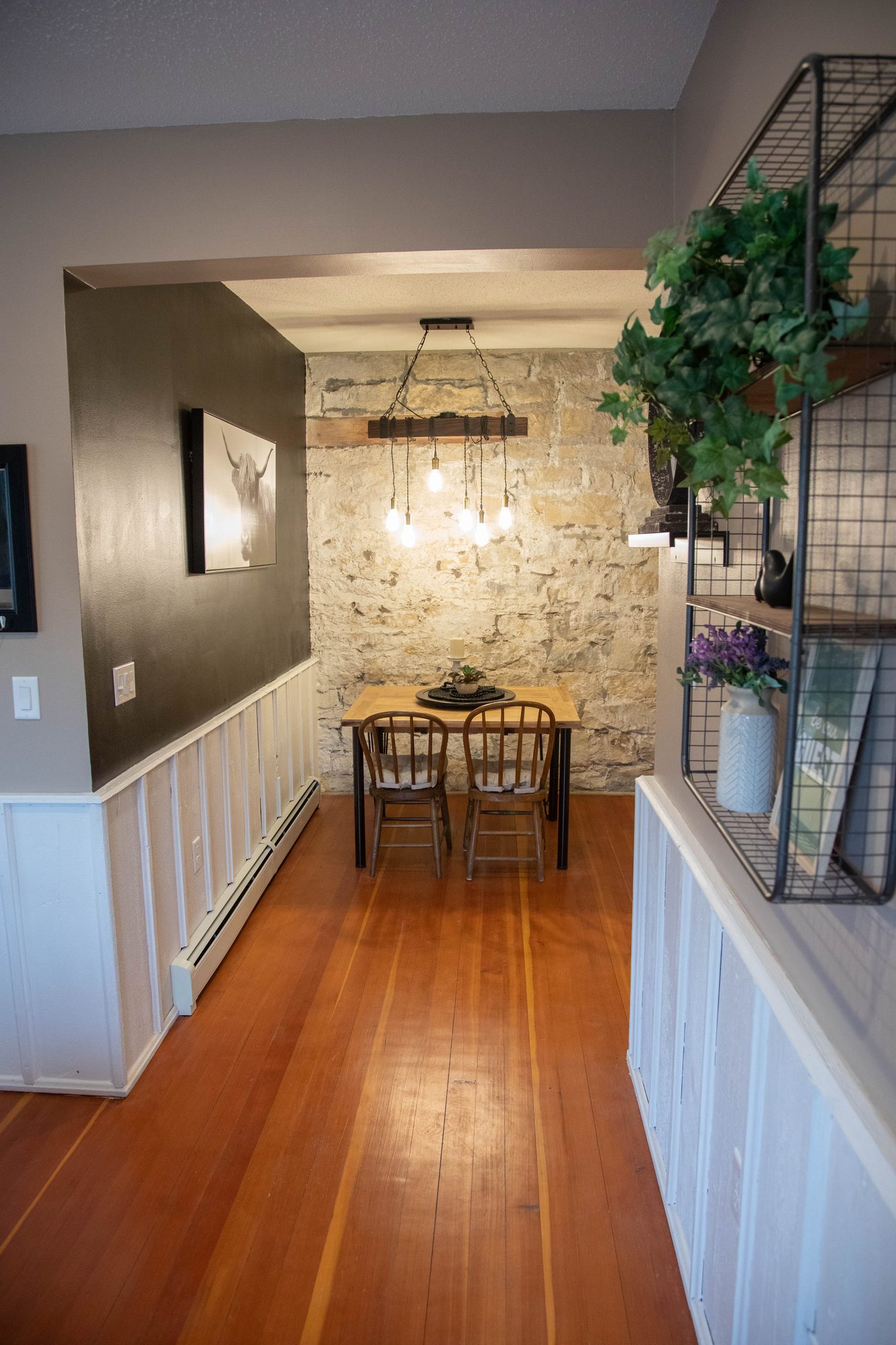 Suite B dining table under the limestone wall